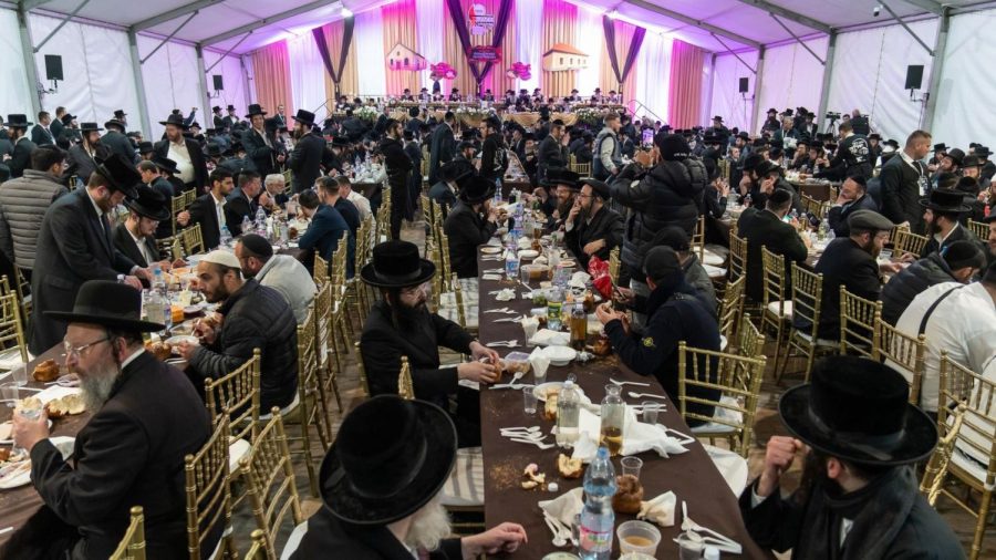 Orthodox Jews gather for a meal in Bodrogkeresztur, Hungary, during an annual pilgrimage to the town that was the home of Rabbi Yeshaya Steiner, also known as Rabbi Shayele. (Barnabas Horvath)