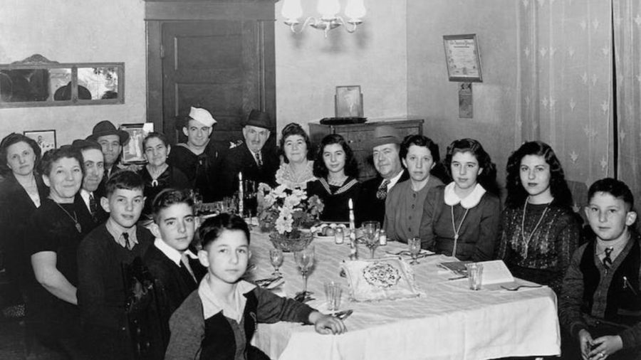 A+Jewish+family+welcomes+home+their+Navy+man+and+gathers+for+a+Passover+Seder+at+their+home+in+St.+Paul%2C+Minnesota+in+1943.+Minnesota+Historical+Society%2FCORBIS%2FCorbis+Historical+via+Getty+Images