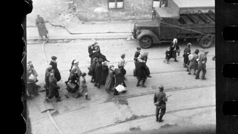 Jews being led to Umschlagplatz; photo taken from a window of St Zofia Hospital at the corner of Żelazna and Nowolipie Streets, most likely (to be confirmed) overlooking Nowolipie Street; author’s comment noted after the war at the back of the print held in the USHMM archive in Washington, DC:
”Scenes from the evacuation of the ghetto, ca 20 April 1943”
Photo: Z. L. Grzywaczewski / from the family archive of Maciej Grzywaczewski, son of Leszek Grzywaczewski / scan of the negative: POLIN Museum, Archaeology of Photography Foundation
