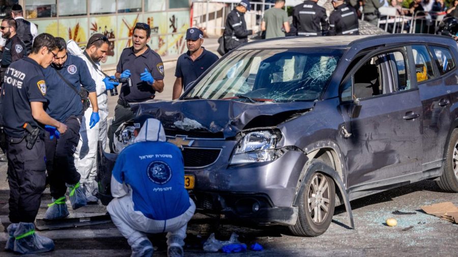 Israeli security at the scene of a car-ramming terror attack outside the Mahane Yehuda market in Jerusalem, April 24, 2023 (Yonatan Sindel/Flash90)