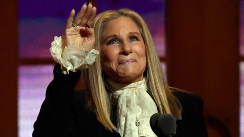 Barbara Streisand waving. 