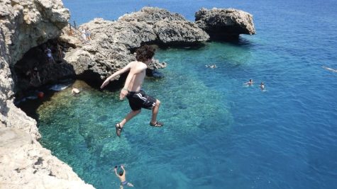 Cliff jumping off the Cypriot coast near Ayia Napa is one of the many activities available to participants at Free Spirit Holina Cyprus.