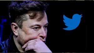 In this photo illustration, the image of Elon Musk is displayed on a computer screen and the logo of twitter on a mobile phone in Ankara, Turkiye on Oct. 6, 2022. (Muhammed Selim Korkutata / Anadolu Agency)