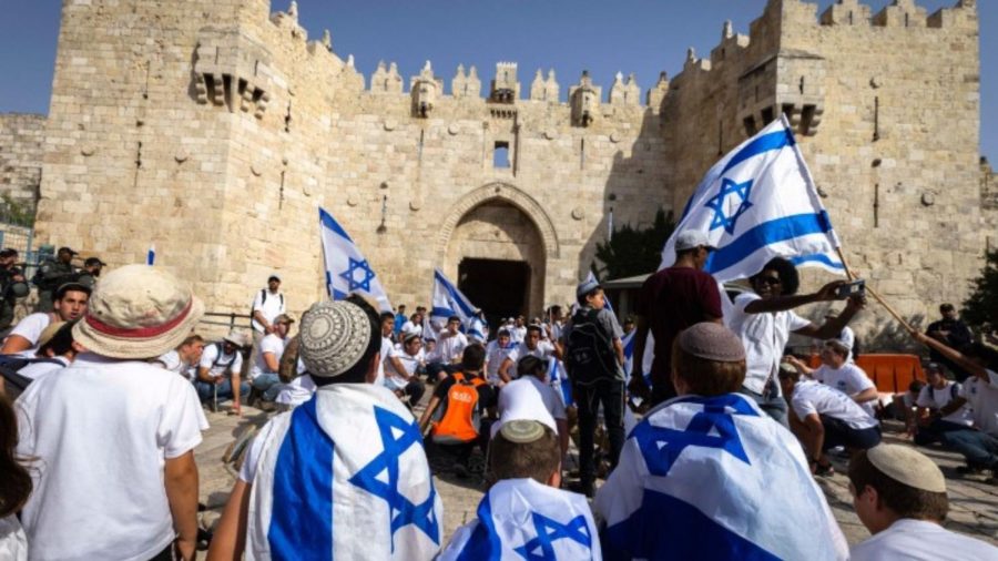 Jews dance at Damascus Gate outside the Muslim Quarter during Jerusalem Day celebrations, May 29, 2022. Photo by Olivier Fitoussi/Flash90.