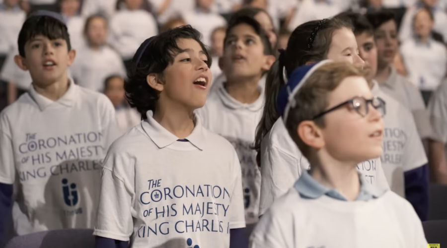 Children from British Jewish schools sing a new version of Adon Olam in honor of the coronation of King Charles III.