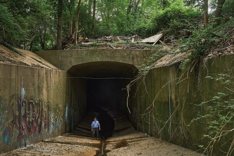 Hydrologist Bob Criss stands in the entrance to the tunnel where the River Des Peres begins its underground descent. 