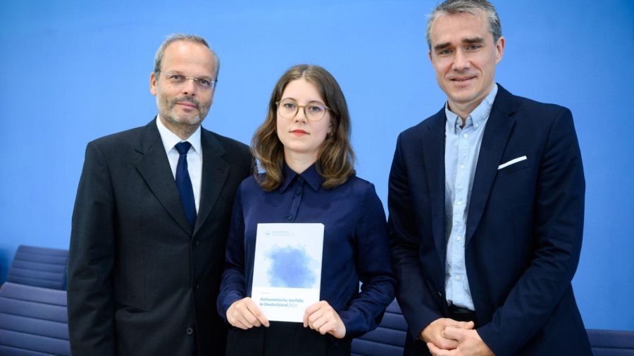 From left to right: Felix Klein, Germany's antisemitism monitor; Bianca Loy, co-author of the RIAS report; and Benjamin Steinitz, executive director of RIAS, shown in Berlin with the organization's 2022 antisemitism report, June 27, 2023. (Bernd von Jutrczenka/picture alliance via Getty Images)