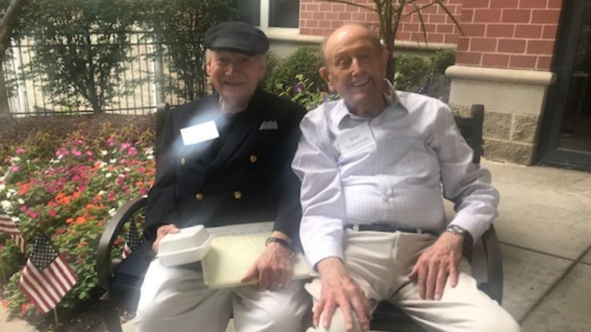 Burton Greenberg (left) and Stan 
Towerman in front of Brookdale Creve Coeur, where their 75th reunion luncheon took place on June 29.