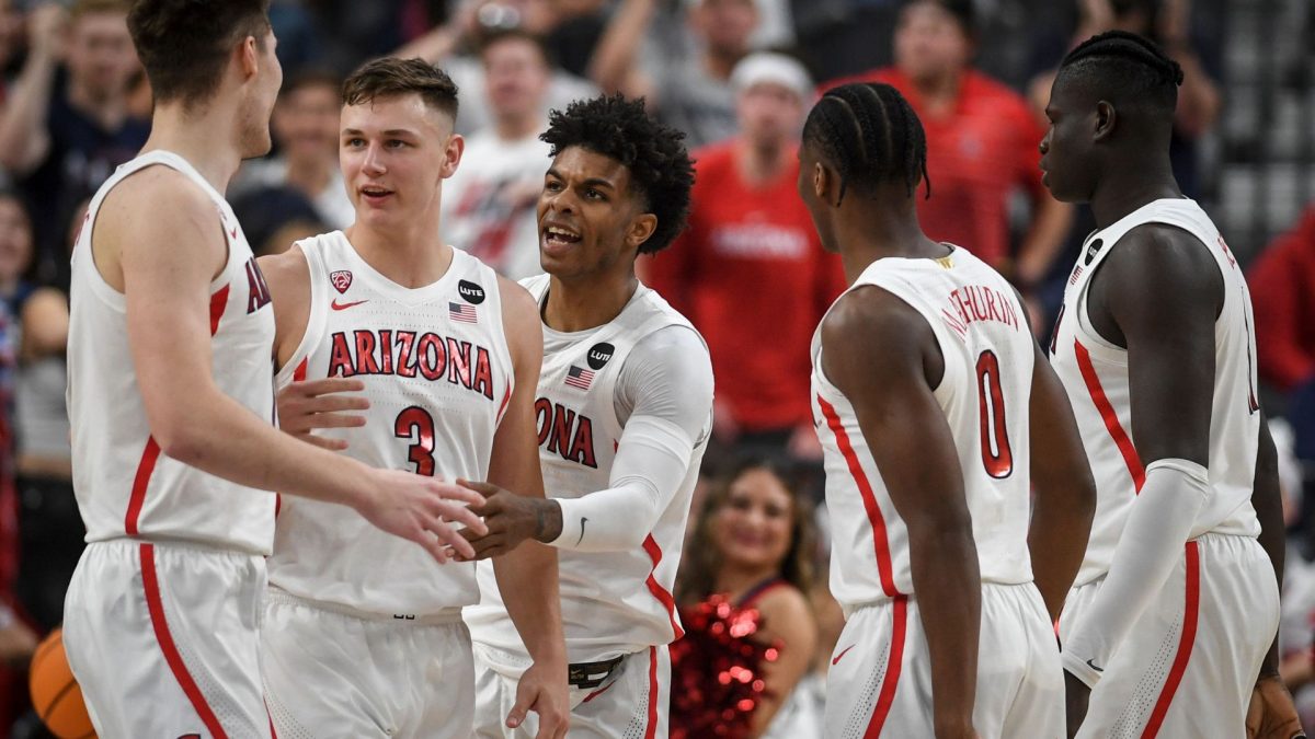 The+Arizona+Wildcats+celebrate+during+the+semifinal+PAC-12+conference+tournament+game+at+T-Mobile+Arena+in+Las+Vegas%2C+March+11%2C+2022.+%28AAron+Ontiveroz%2FMediaNews+Group%2FThe+Denver+Post+via+Getty+Images%29
