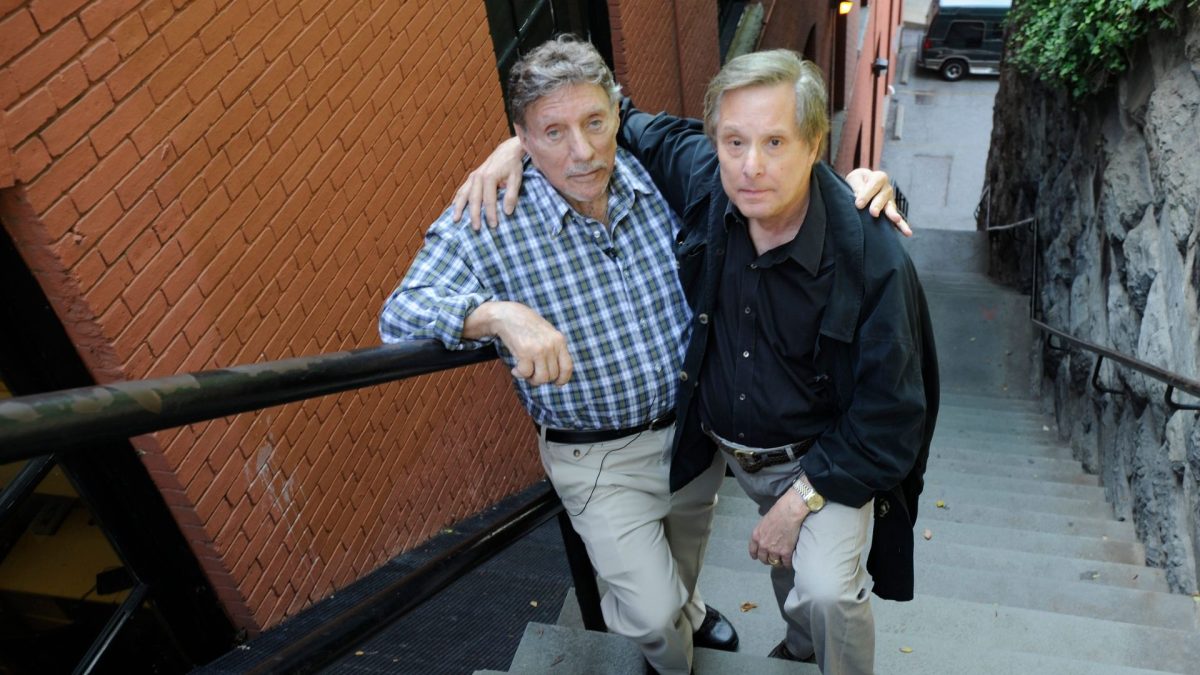 Author William Peter Blatty, left, and director William Friedkin pose on the Exorcist steps, the outdoor staircase in Washingtons Georgetown enclave made famous by the movie.