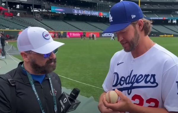 Rob Friedman, left, interviews three-time Cy Young Award winner Clayton Kershaw at MLBs 2023 All-Star Weekend in Seattle. 
