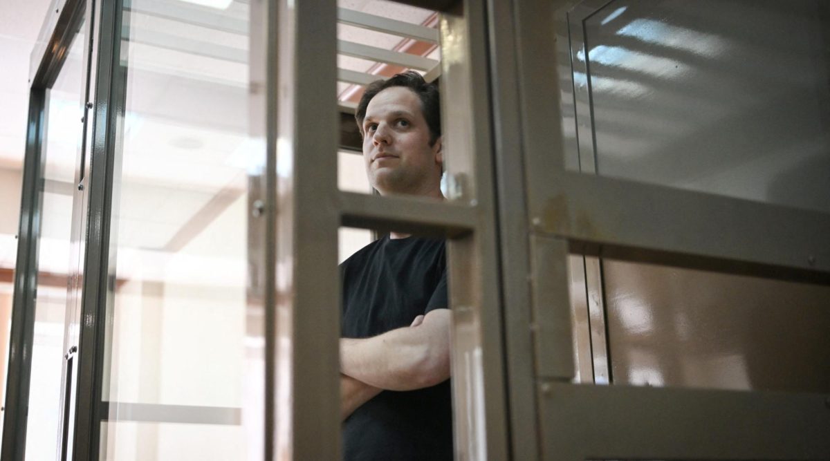US journalist Evan Gershkovich stands inside a defendants cage at Moscow City Court on June 22, 2023.