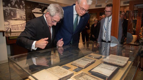 Jonathan Brent, executive director and CEO of YIVO, and Gitanas Nausėda, president of Lithuania, examine holdings in the Strashun Rare Books Room at YIVOs New York headquarters, Sept. 18, 2023. The room is named for a Jewish scholar in Vilna (now Vilnius) who collected nearly 7,000 volumes of Yiddish and other books before his death in 1885.