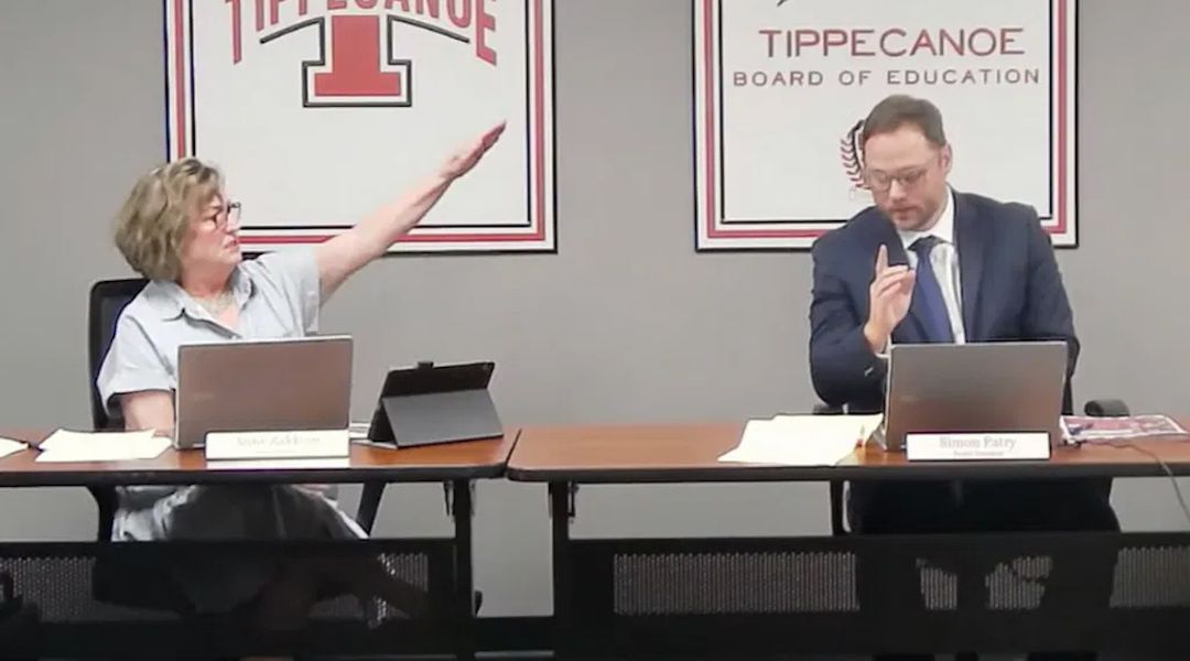 Tipp City Board of Education member Anne Zakkour delivers a Nazi salute and utters "Sieg Heil" at board then-president Simon Patry during a public meeting, Sept. 5, 2023. 