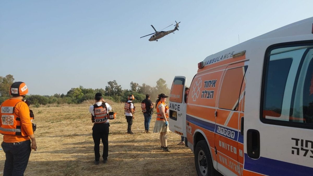A United Hatzalah team transport a patient to a helicopter for emergency evacuation to hospital.