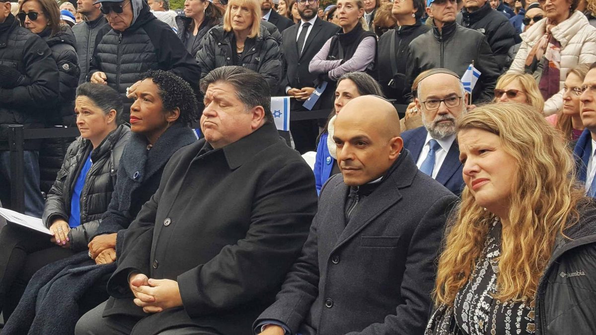 Illinois Gov. J.B. Pritzker sitting alongside State of Illinois Comptroller Susana A. Mendoza, Lt. Gov. Juliana Stratton and Israel's consul general to the Midwest, Yinam Cohen, at an Israel solidarity rally in Glencoe, Ill., on Oct. 10, 2023. 