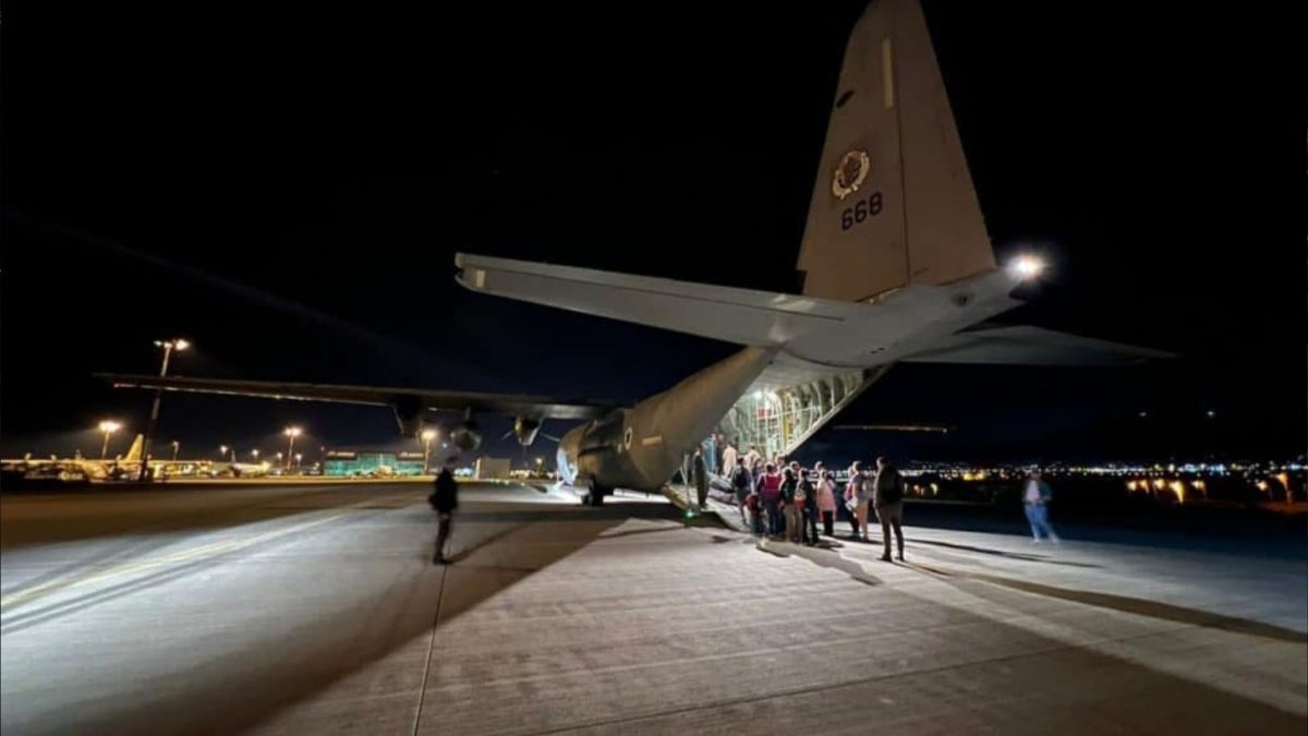 IDF reservists board an Israel Air Force Hercules transport plane in an undisclosed European country, Oct. 9, 2023. Credit: IDF.