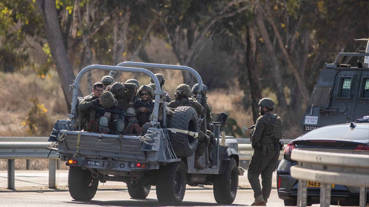Israeli soldiers patrol a main road near the southern Israeli city of Sderot, Oct. 7, 2023. 