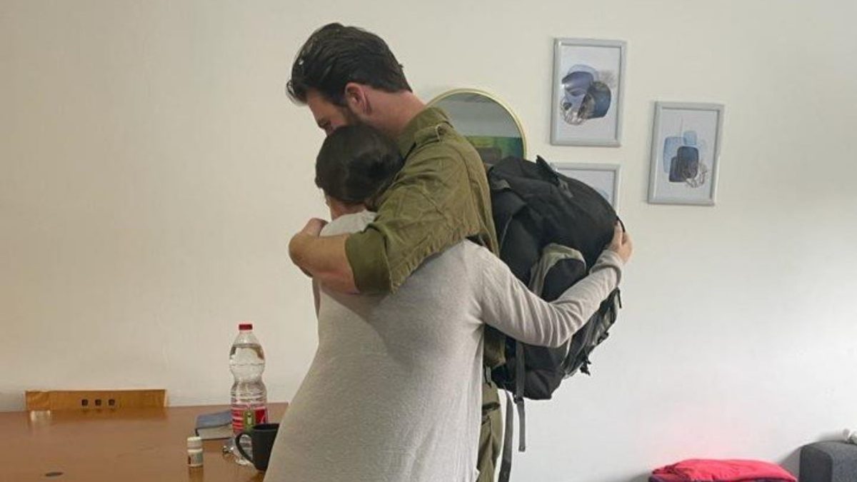  My son hugs his sister before deploying to Israel’s northern border.