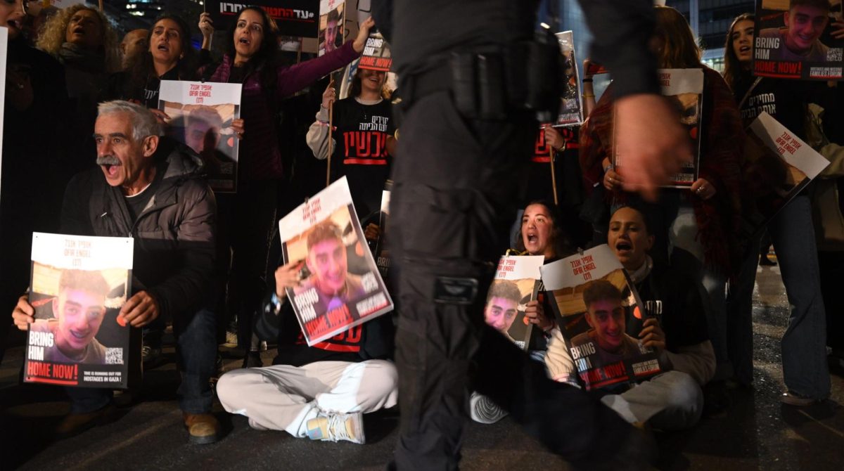Families of the hostages, and their supporters call for the release of all the hostages during a demonstration outside The Kirya ahead of the war cabinet meeting on the fifth day of the temporary truce, in Tel Aviv, Nov. 28, 2023. 