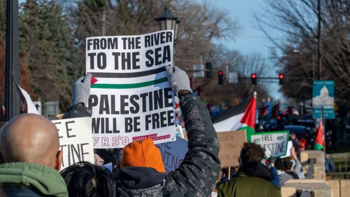 Protesters at a pro-Palestinian rally in St. Paul, Minnesota, push the state to divest from Israel in the wake of the war in Gaza, Nov. 19, 2023. 
