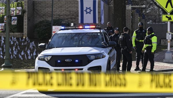 Police take security measures and investigate the crime scene after 25-year-old Aaron Bushnell, an active-duty member of the US Air Force, set himself on fire Sunday outside the Israeli Embassy in Washington, D.C., Feb. 25, 2024. (Celal Gunes/Anadolu via Getty Images)