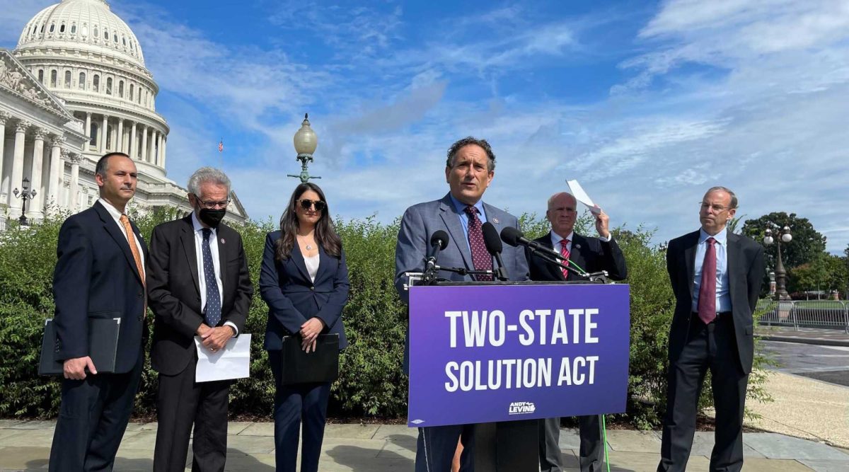 Rep. Andy Levin speaks at a press conference introducing his Two-State Solution Act on Capitol Hill, Sept. 23, 2021. He is flanked by, from left: Hadar Susskind, the president and CEO of Americans for Peace Now; Rep. Alan Lowenthal; Rep. Sara Jacobs; Rep. Peter Welch; and J Street President Jeremy Ben-Ami. (Ron Kampeas)