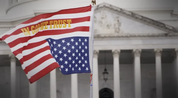 In God and Country, a documentary produced by Rob Reiner, footage from real events showcases the signs and symbols of growing Christian nationalism in the United States. (Screenshot)