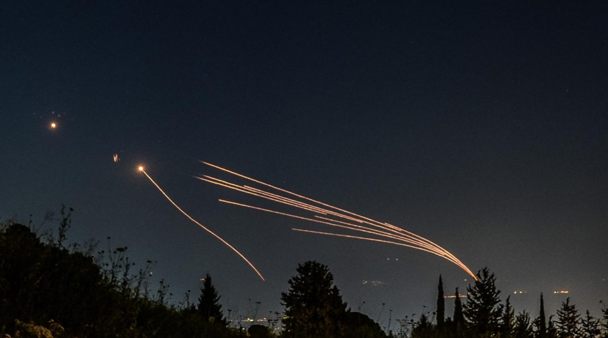 Iron dome anti-missile system fires interception missiles as rockets fired from Lebanon, as it seen over the Hula Valley, April 12, 2024. (Ayal Margolin/Flash90)