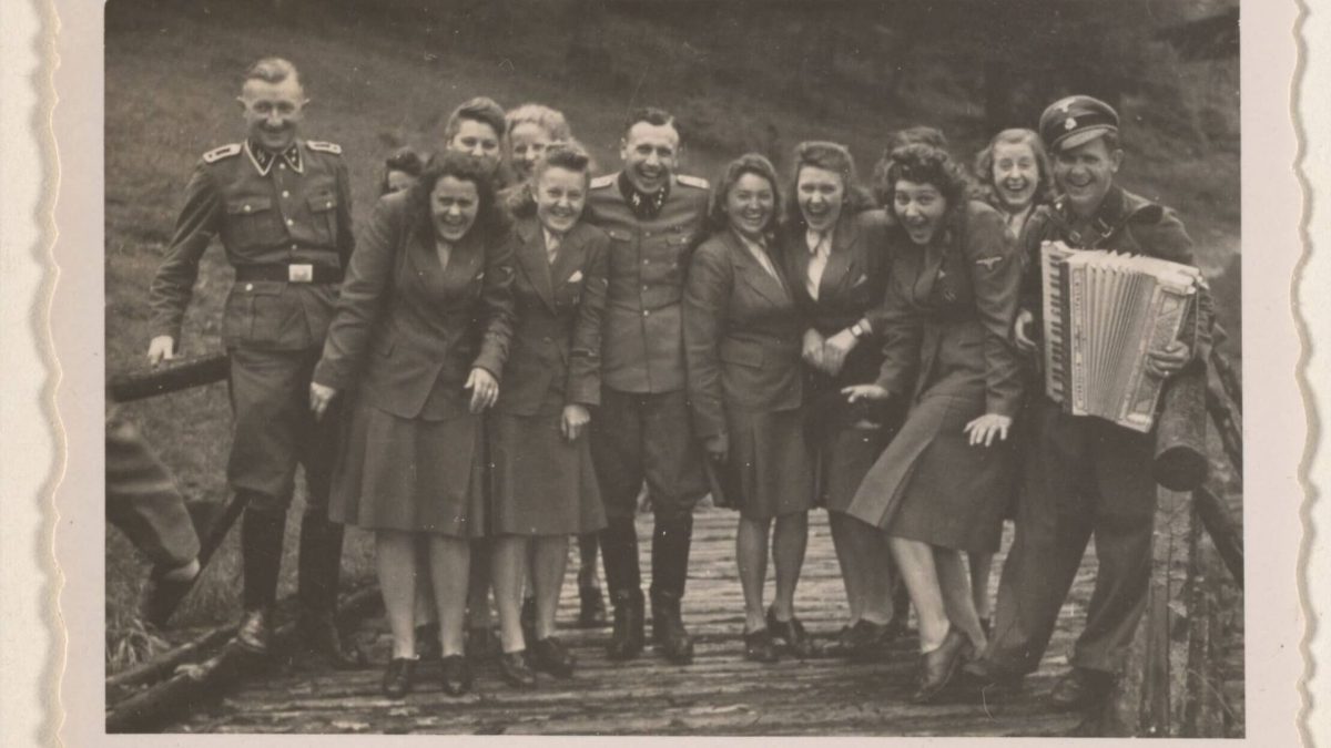 Women%E2%80%99s+auxiliaries+and+SS+officers+enjoy+music+not+far+from+the+barracks+of+Auschwitz-Birkenau.+%0A