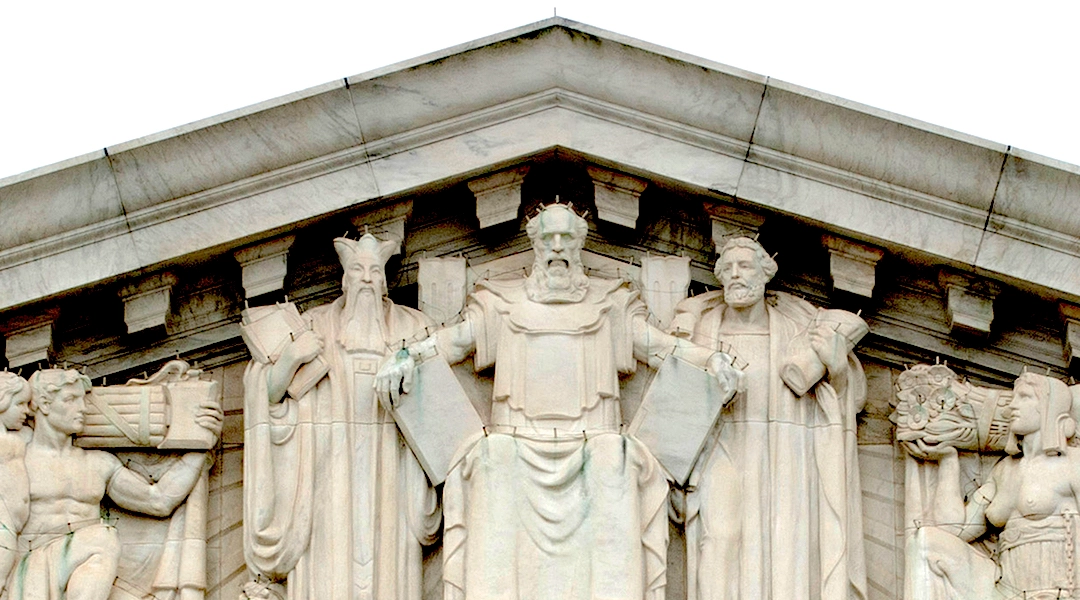 A carving of Moses receiving the Ten Commandments on the facade of the U.S. Supreme Court building in Washington, D.C. Proponents of public displays of the decalogue say it has historical, not just religious, significance. (Steve Petteway/Collection of the Supreme Court of the United States)