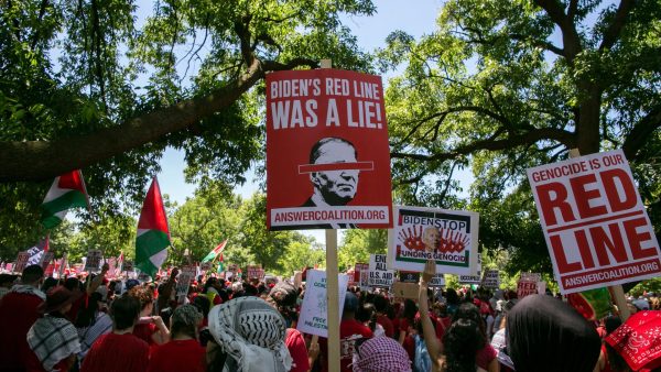 Thousands of pro-Palestinian demonstrators wearing red clothes surrounded the White House with a long red banner symbolizing President Bidens red line regarding an Israeli invasion of Rafah. 