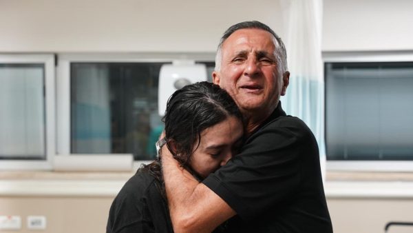 Noa Argamani embraces her father, Yaakov, after her rescue from captivity, June 8 2024. (Israeli Army Spokesman)