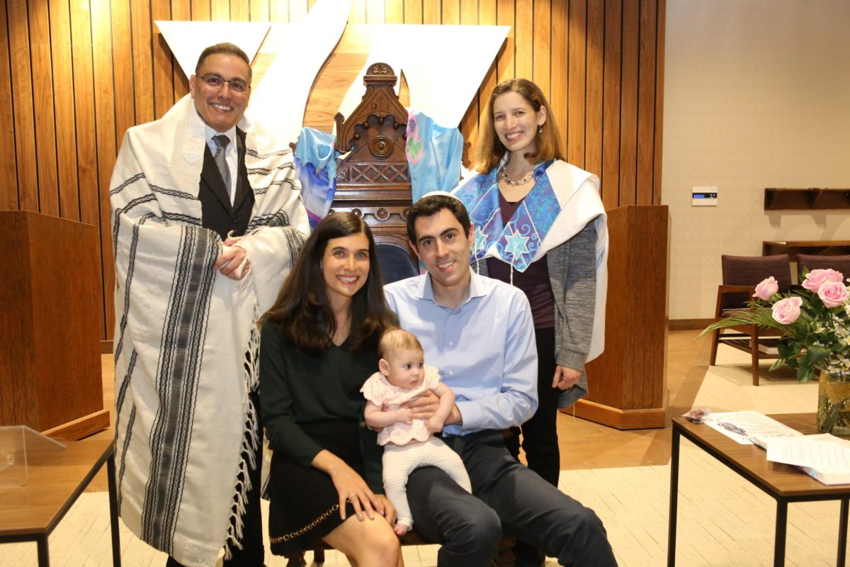 Rabbi Carnie Rose (left) and Cantor Sharon Nathanson (right) of Congregation B’nai Amoona took part in the baby naming ceremony for Ella Rose Solarz, who is pictured with her parents, Jessica Rubin and Ben Solarz.