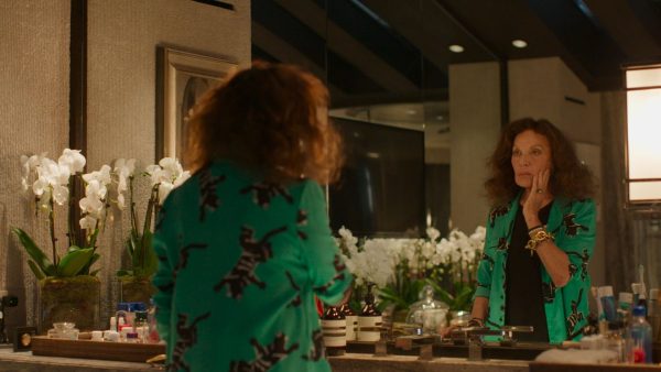 Diane von Furstenberg looks at herself in the mirror in a still from ‘Diane von Furstenberg: Woman in Charge’. (Courtesy Hulu)