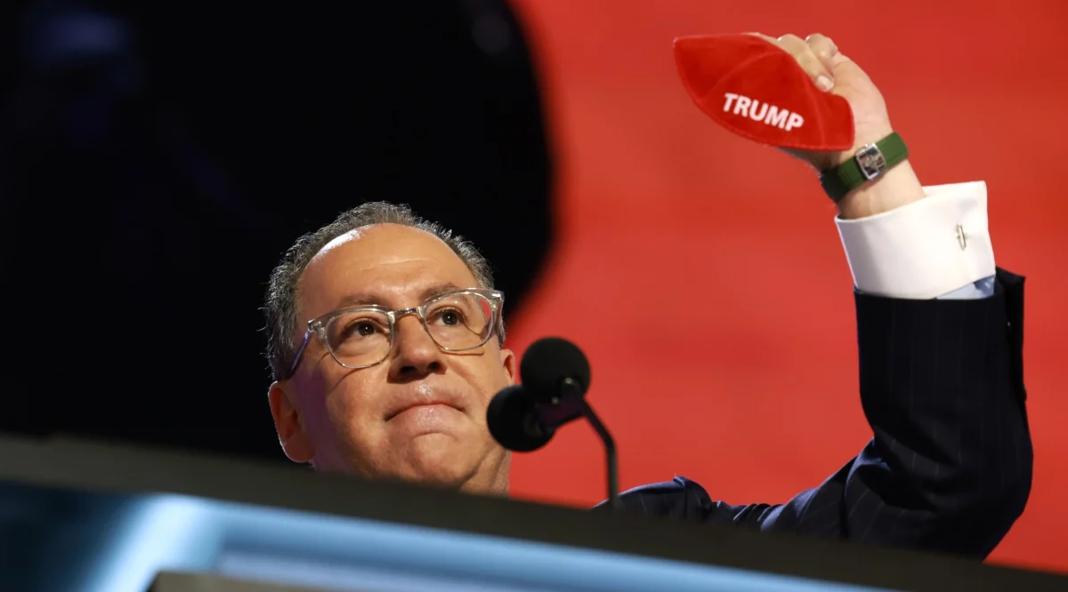 Matt Brooks, CEO of Republican Jewish Coalition holds up a kippah with the name "Trump" on stage on the second day of the Republican National Convention at the Fiserv Forum, Milwaukee, July 16, 2024. (Joe Raedle/Getty Images)