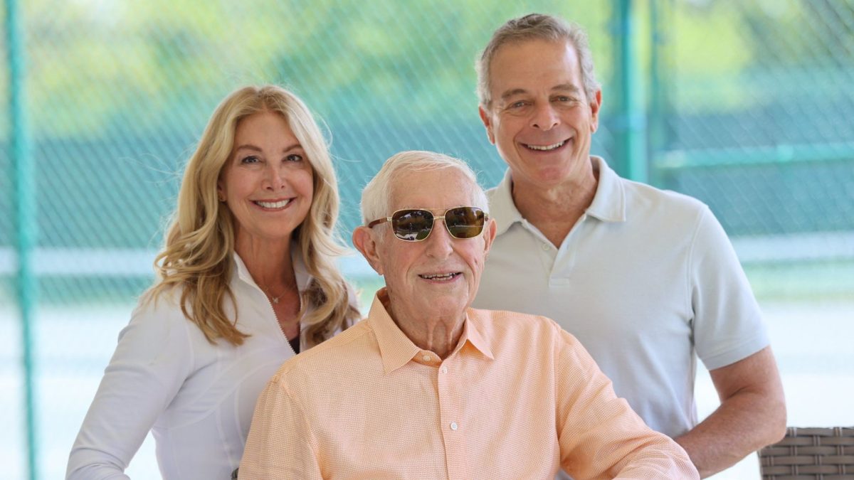 Les Nackman (center) is flanked by his daughter, Linda Horwitz, and son-in-law Phil Horwitz. Nackman is a longtime supporter of and fundraiser for the Israel Tennis & Education Center.  
