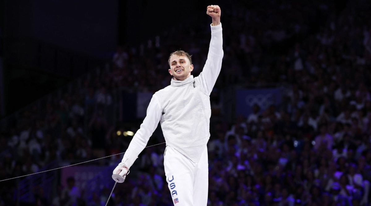 Nick Itkin celebrates winning the men's foil individual bronze medal at the 2024 Paris Olympics, July 29, 2024, in Paris. 