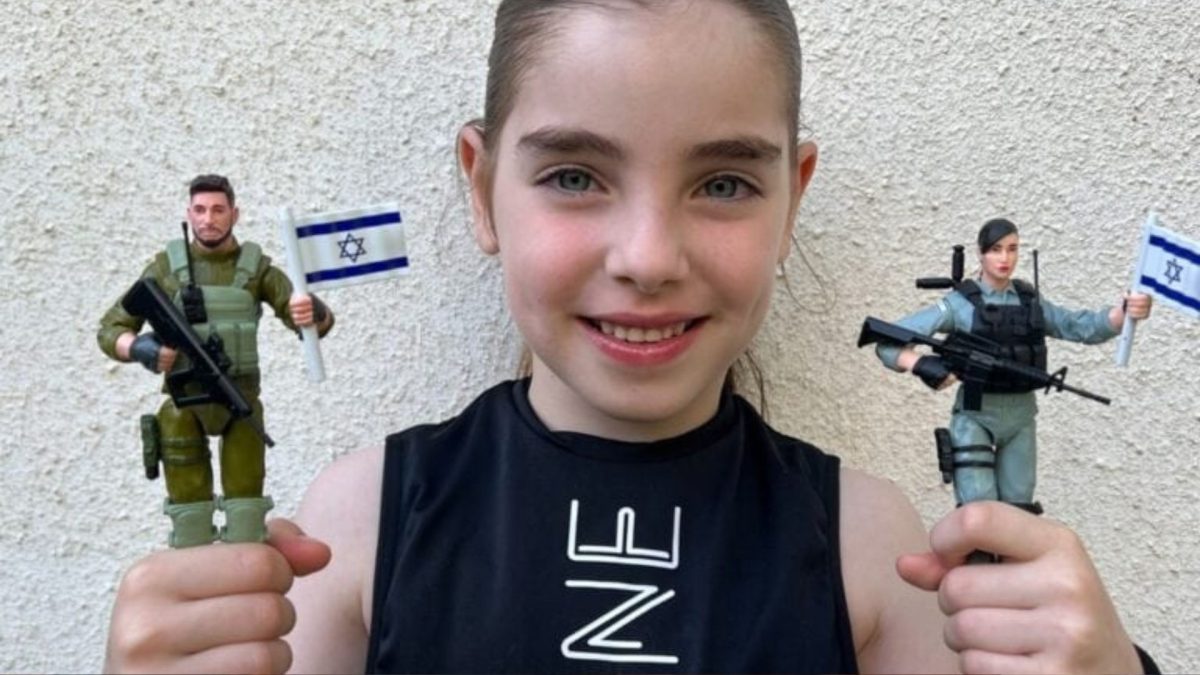 An Israeli child holding the Giborei Israel toy soldiers. Photo courtesy of Giborei Israel
