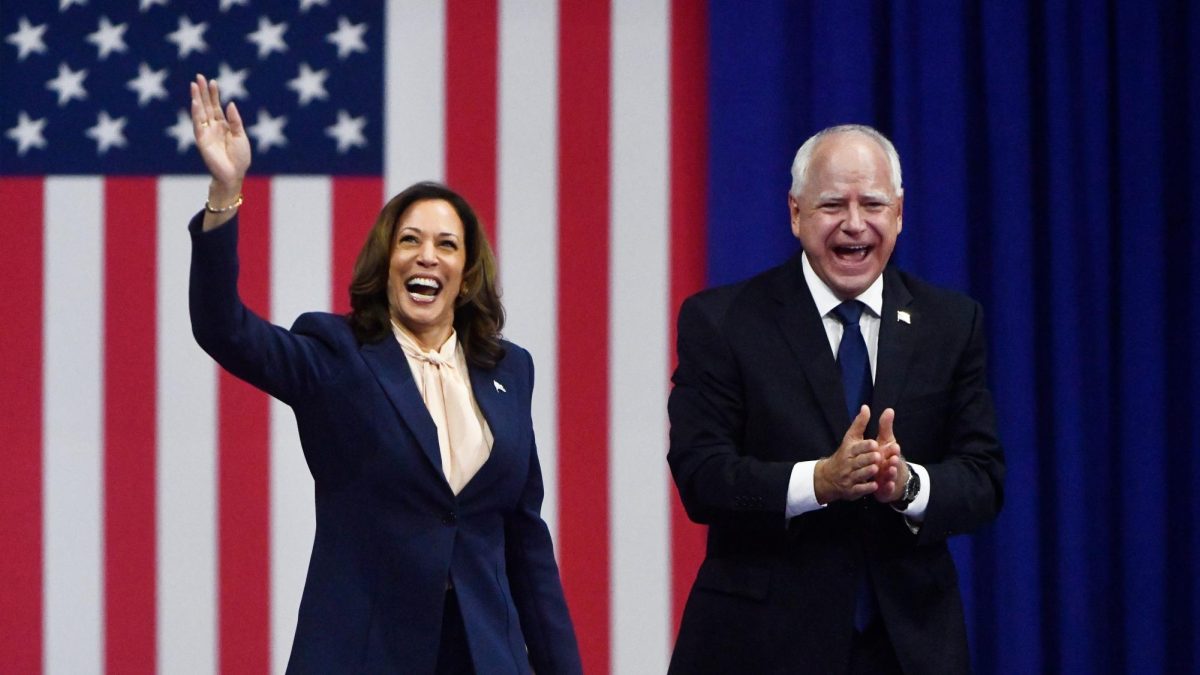 Vice President Kamala Harris enters the stage with her running mate Minnesota Governor Tim Walz as Harris holds a rally at Temple University in Philadelphia on Tuesday, August 6, 2024 (CHRIS LACHALL/USA TODAY NETWORK ATLANTIC GROUP / USA TODAY NETWORK)