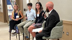 Rabbi Andrew Terkel (on far right) along with (from left) Ladue senior Georgia Bland, Clayton High School senior Micah Lotsoff and Whitfield senior Ella Wertman.  
