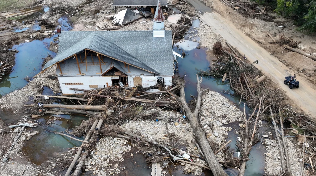 In an aerial view, a person rides past a destroyed church in the aftermath of Hurricane Helene flooding,  Swannanoa, North Carolina,  Oct. 6, 2024 .(Mario Tama/Getty Images)