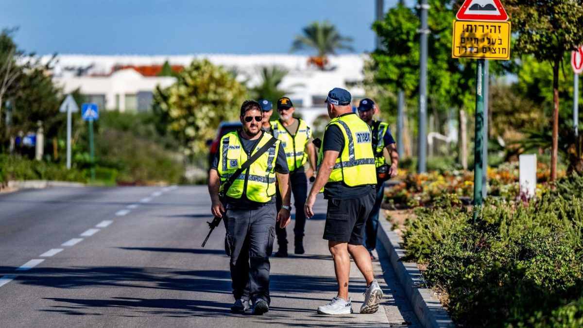 Israeli security forces at the scene where a drone fired from Lebanon caused damage in Caesarea, Oct. 19, 2024. 

