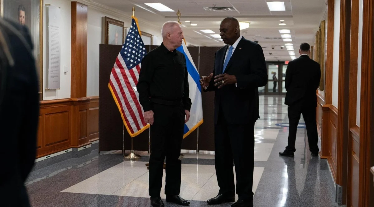 Israeli Defense Minister Yoav Gallant, left, chats with U.S. Defense Secretary Lloyd Austin in the Pentagon, June 25, 2024. (Ariel Herman)