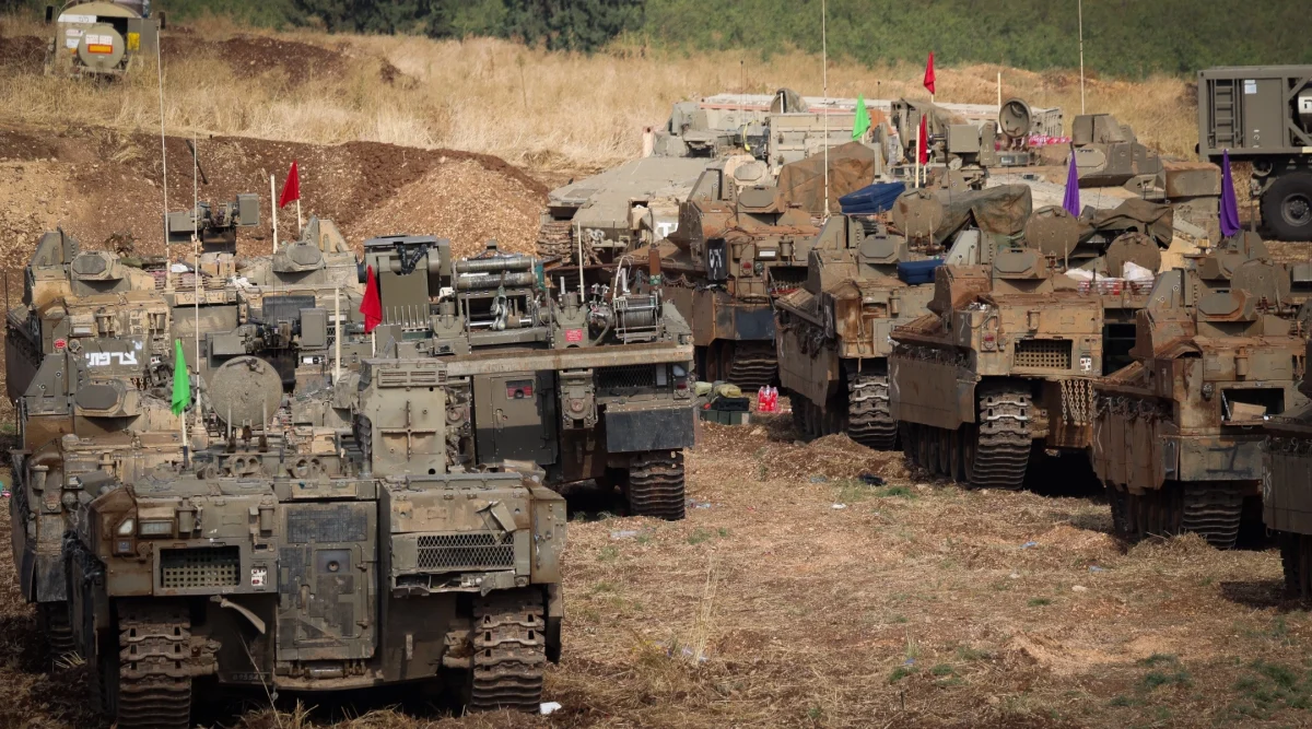 Israeli soldiers seen at a staging area near the Israeli border with Lebanon, Oct. 1, 2024. (David Cohen/Flash90)