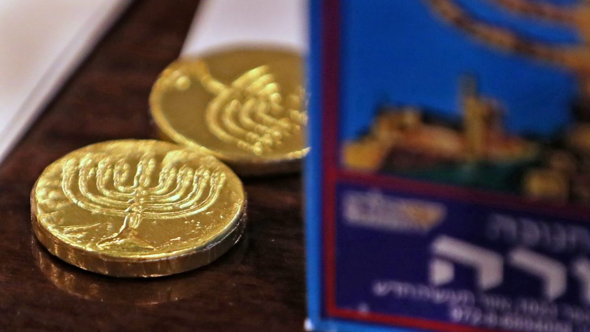 Hanukkah gelt, chocolate coins given to Jewish children during Hanukkah, are among the decorations on the table as the Kavod group has lunch at The Journey buffet, Thursday, Dec. 19, 2019. The Jewish Federation of Greater Indianapolis runs the program that honors Holocaust survivors in the area. This was one of their social outings, which fell right before the start of this year's Hanukkah. The Jewish Federation Of Greater Indianapolis Runs The Kavod Program That Honors Holocaust Survivors In The Area This Was One Of Their Social Outings

