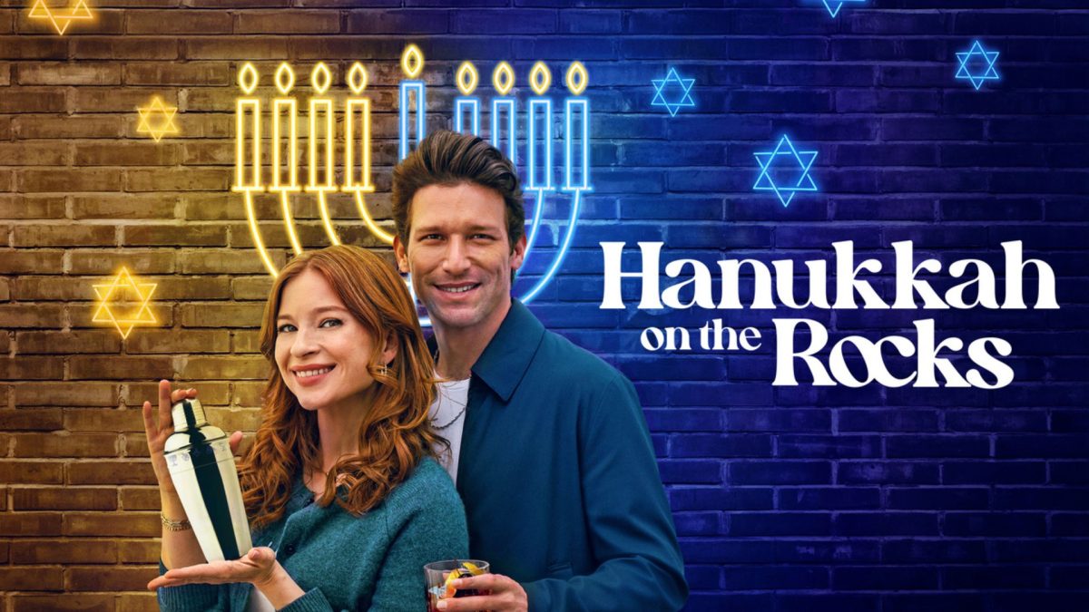 Stacey Farber and Daren Kagasoff in the Hallmark movie  ‘Hanukkah on the Rocks.’ 

