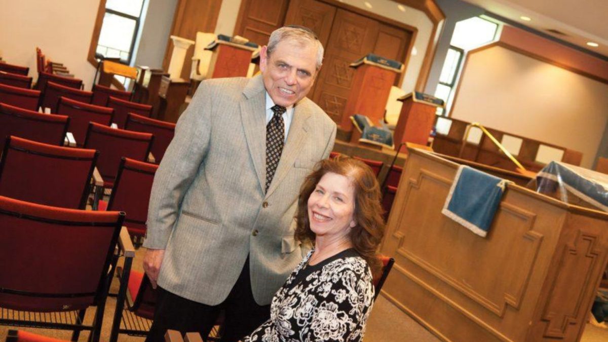 Judy and Dr. Robert Hellman outside Young Israel. 