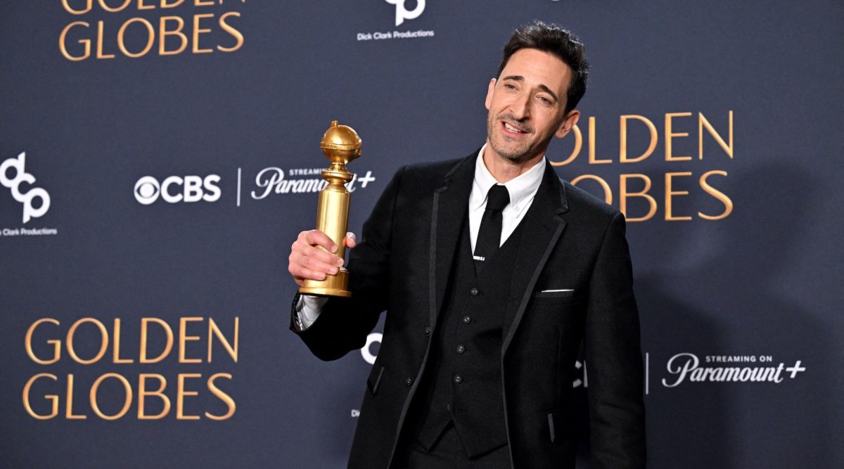 Adrien Brody poses with the Best Performance by a Male Actor in a Motion Picture – Drama award for "The Brutalist" at the Golden Globe Awards in Beverly Hills, California, Jan. 5 2025. (Photo by Robyn Beck / AFP via Getty Images)