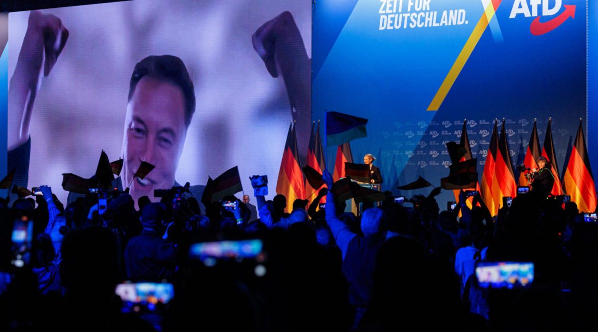 Elon Musk is seen on a large screen as Alice Weidel, co-leader of Germany's far-right Alternative for Germany (AfD) party, addresses an election campaign rally in Halle, Germany, Jan. 25, 2025. (AFP via Getty Images)